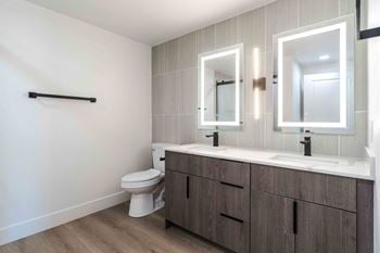 Dual vanity sink in primary bedroom